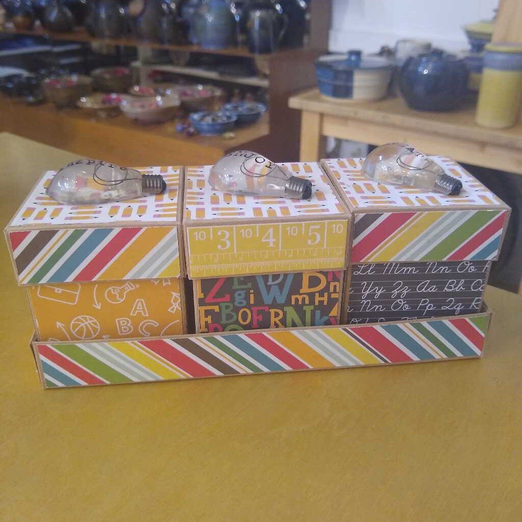 Trio box sets